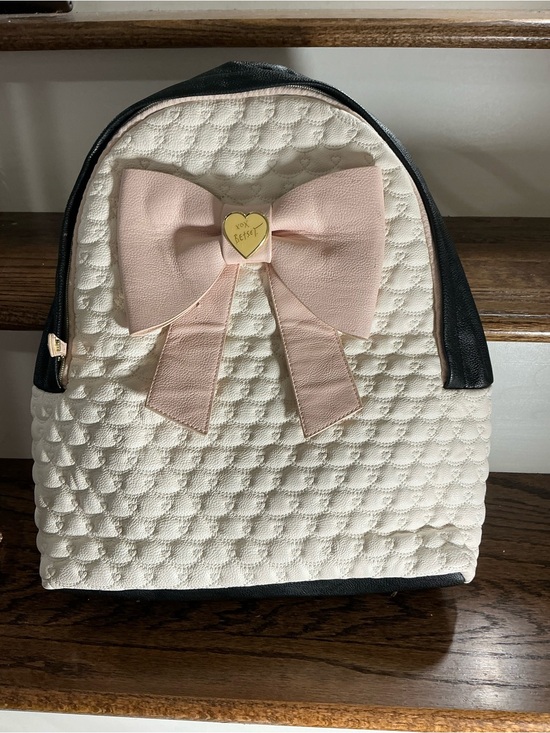 Betsey Johnson Handbags - Betsey Johnson Cream Quilted Backpack with Pink Bow and Black Trim